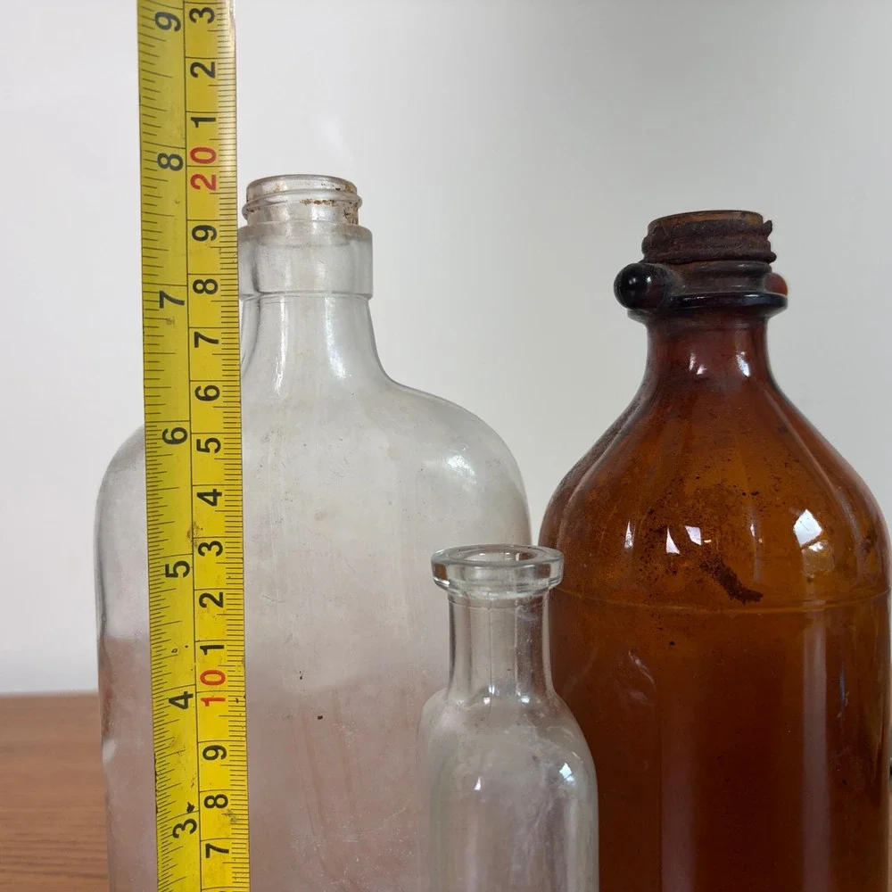 Vintage Glass Bottle Trio Amber and Clear Apothecary Medicine Bottles Set of 3